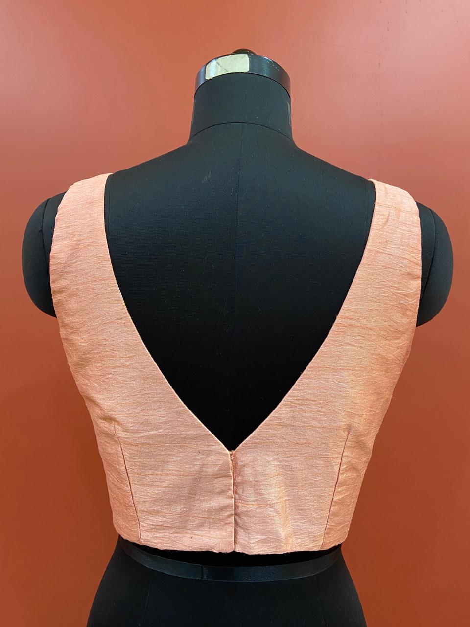 SLEEVLESS BLOUSE