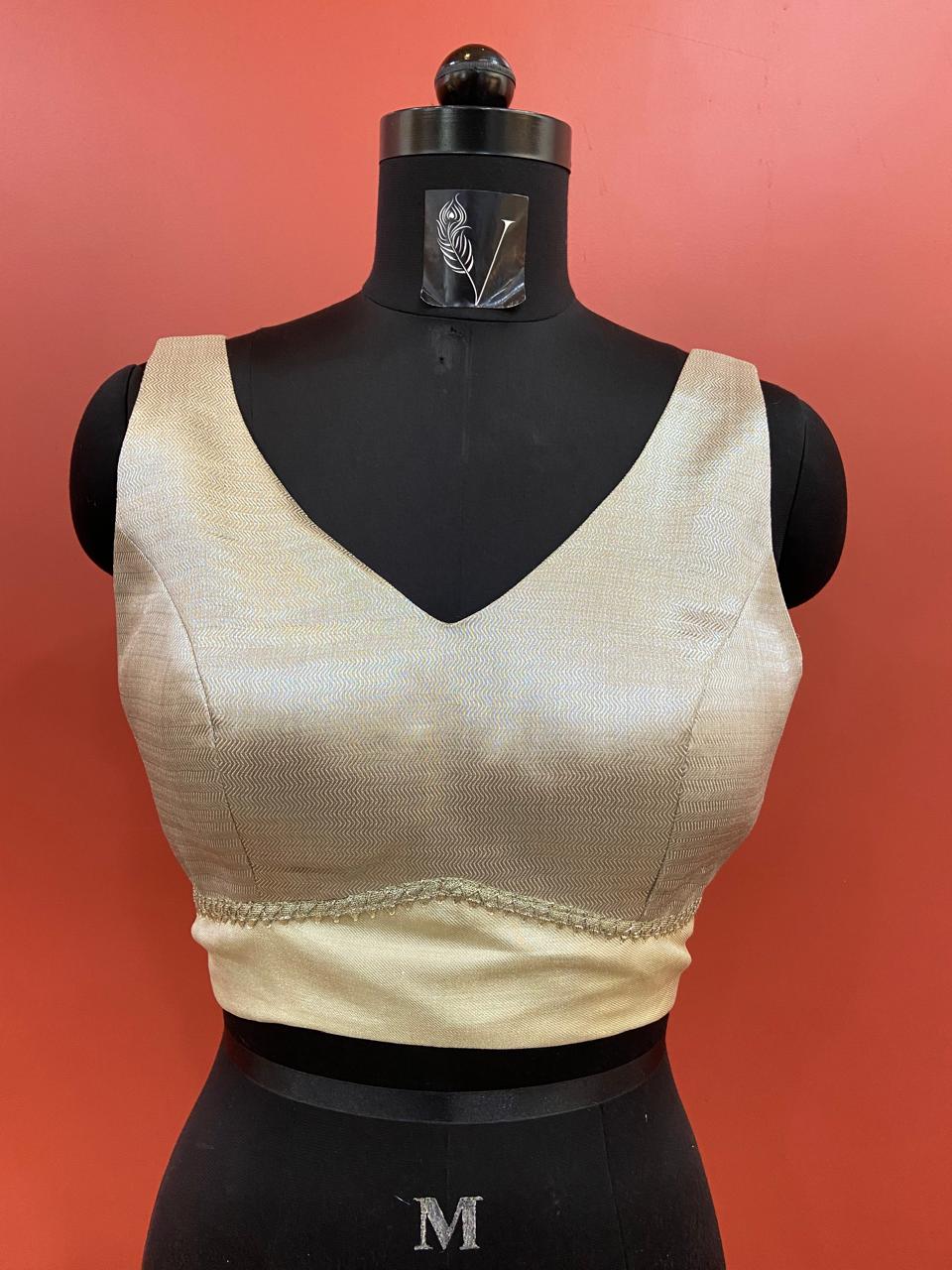 SLEEVELESS BLOUSE