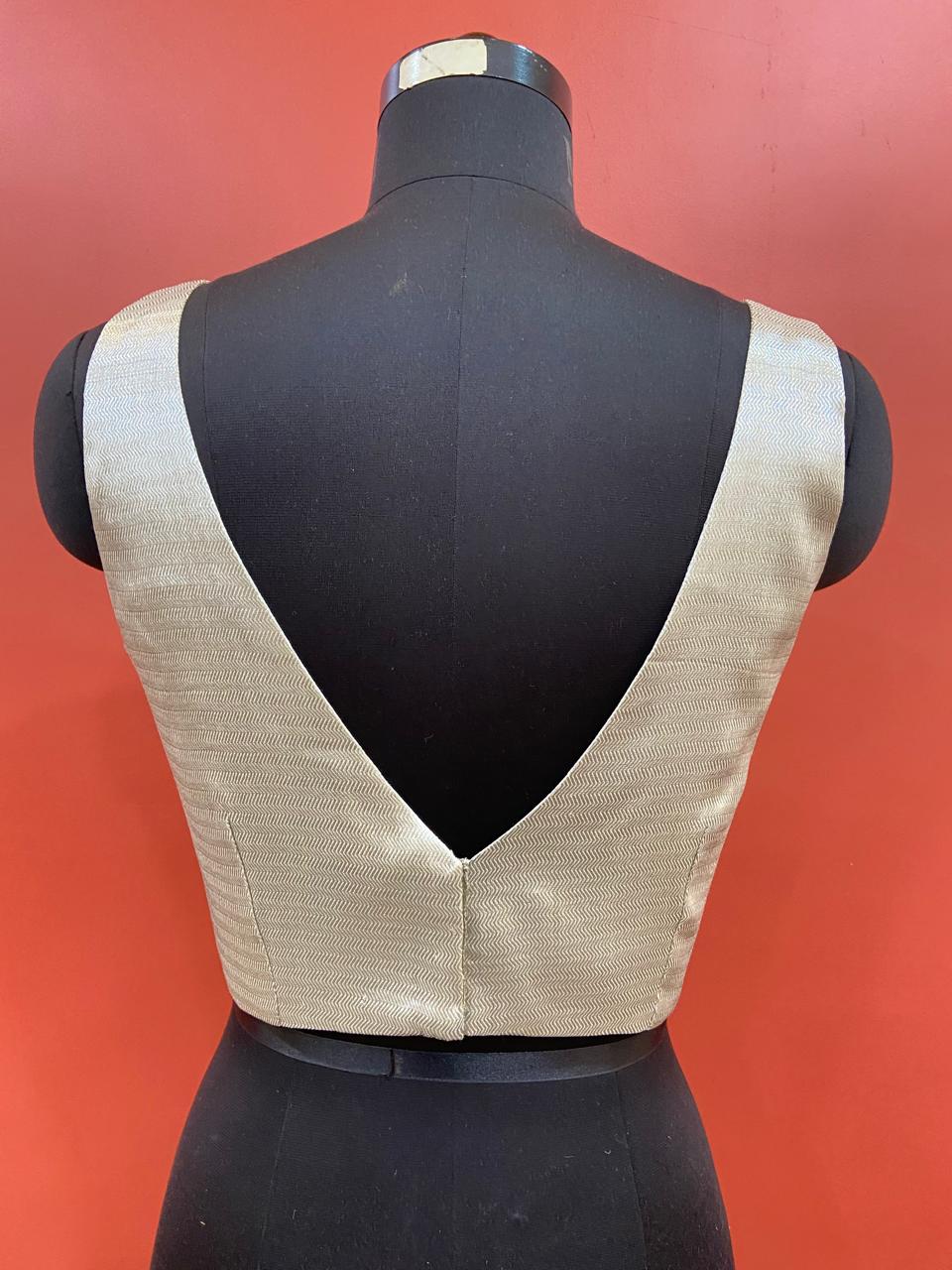 SLEEVELESS BLOUSE