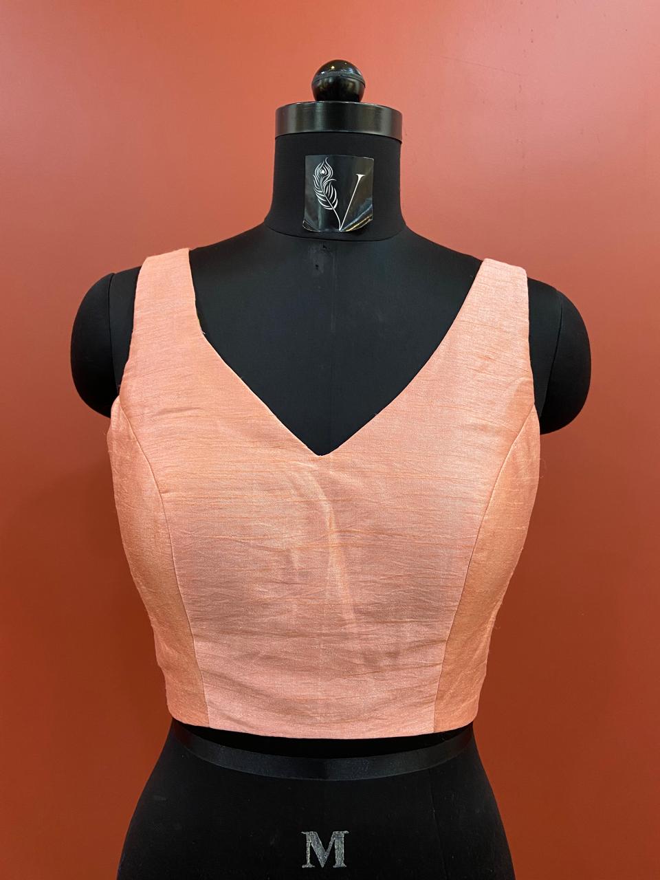 SLEEVLESS BLOUSE