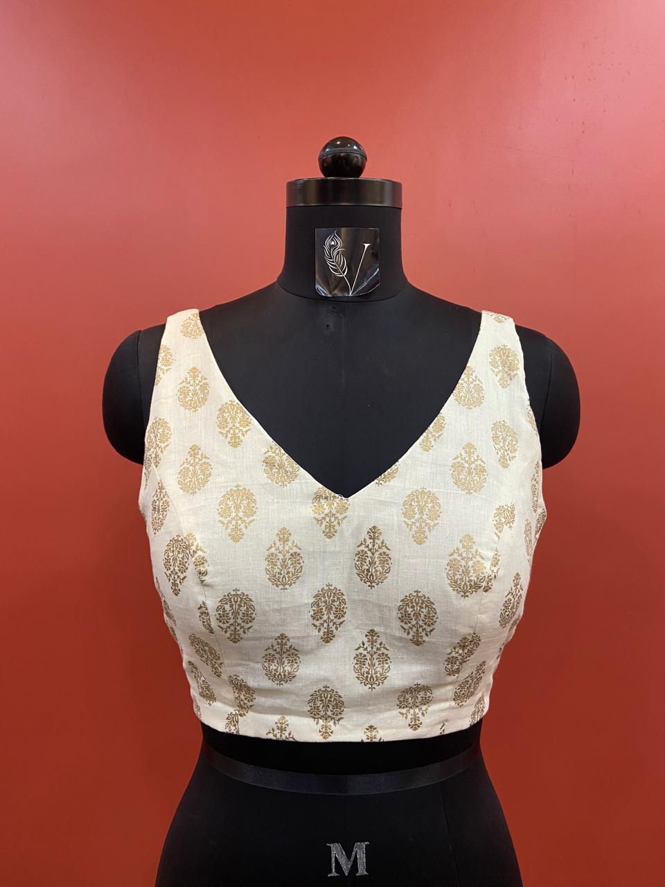 SLEEVLESS BLOUSE