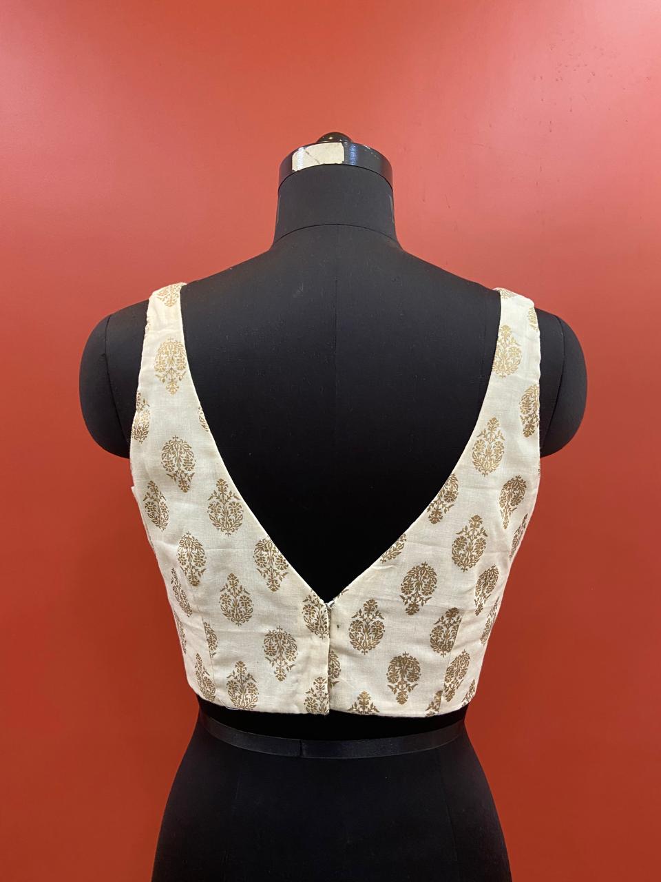 SLEEVLESS BLOUSE