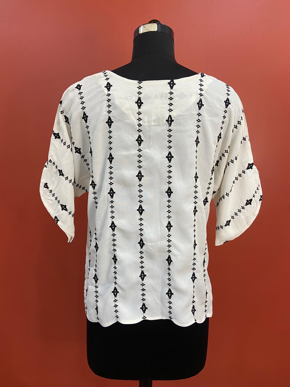 LOOSE FIT TOP