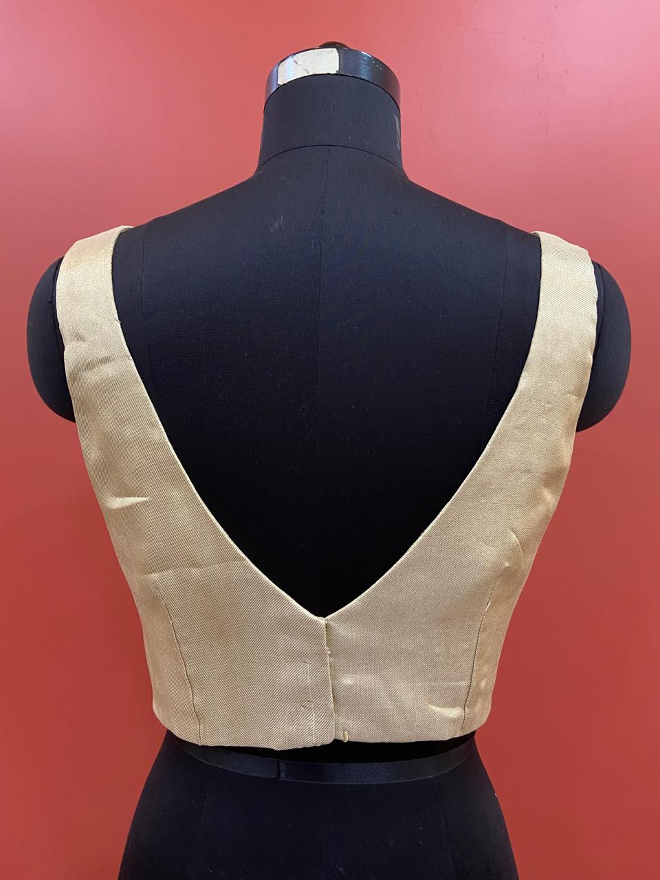 SLEEVELESS BLOUSE